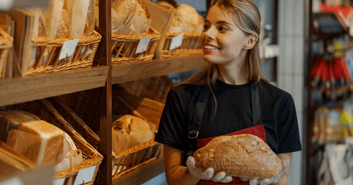 Wholesale baker holding bread